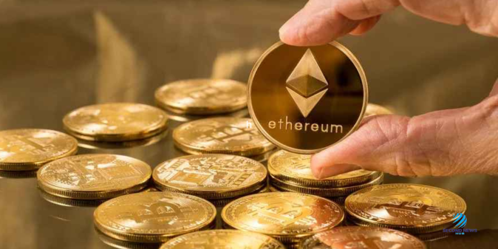 a hand holding a ethereum coin